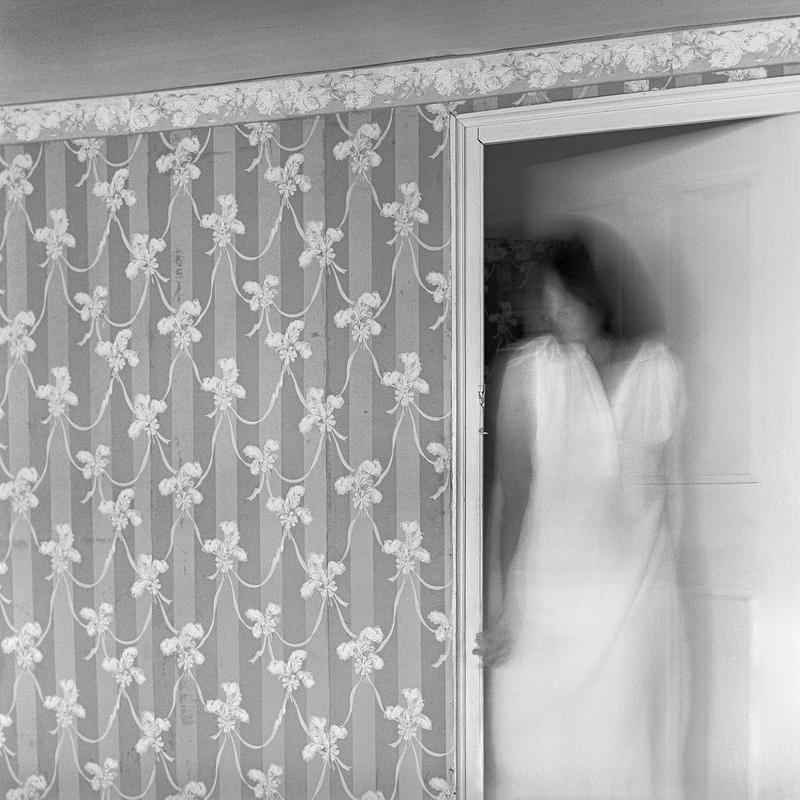 Woman Entering a Room